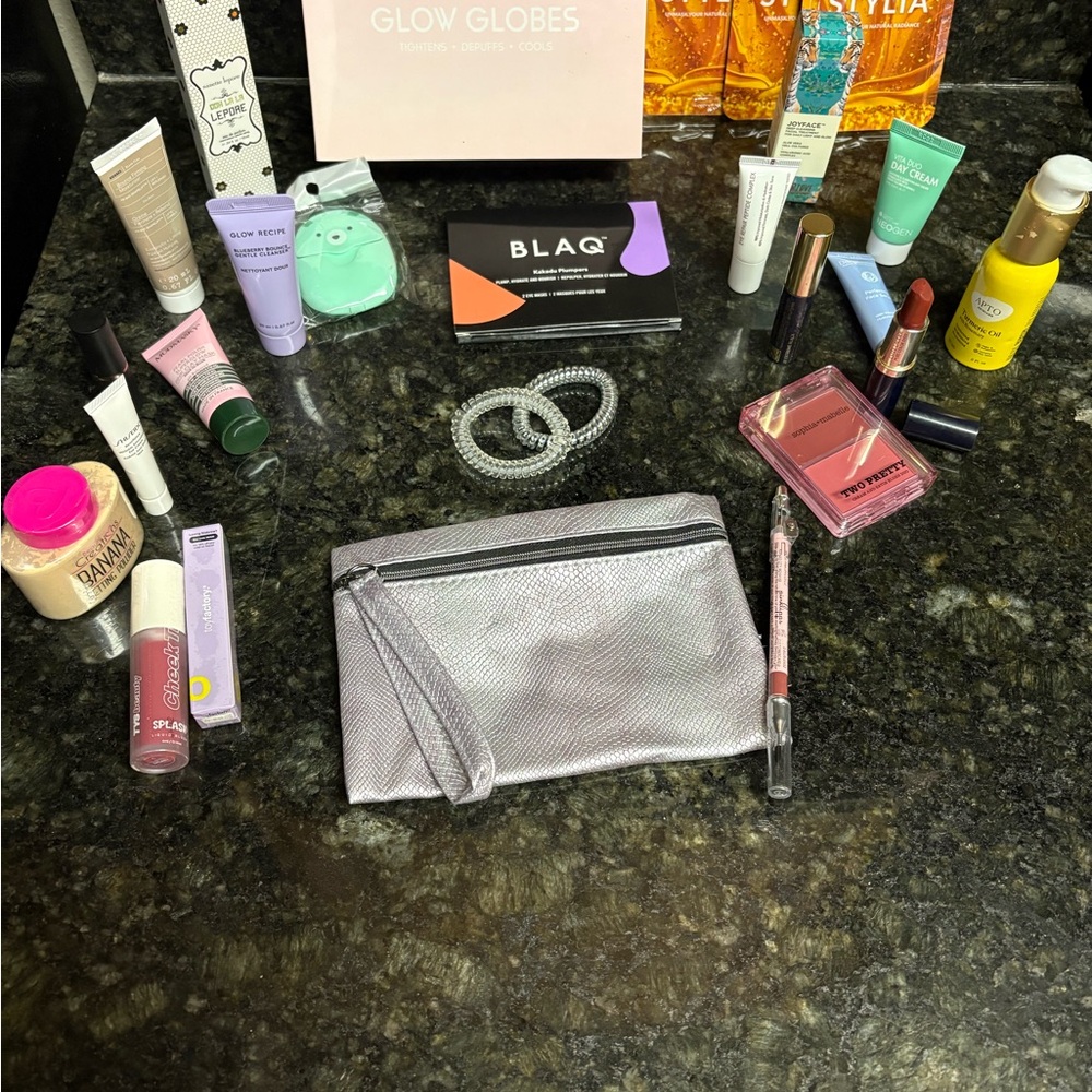 NWOT Mystery Silver Makeup Bag with Assorted Cosmetics